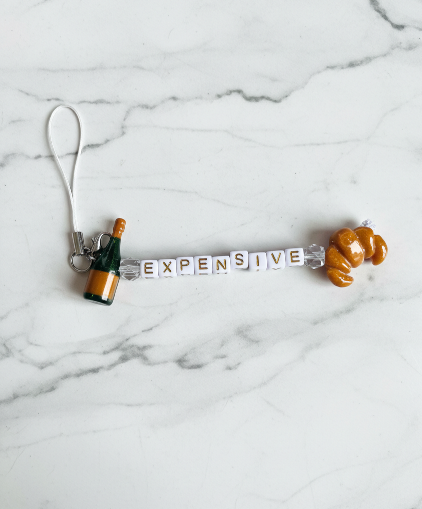 Tres Expensif Phone Charm